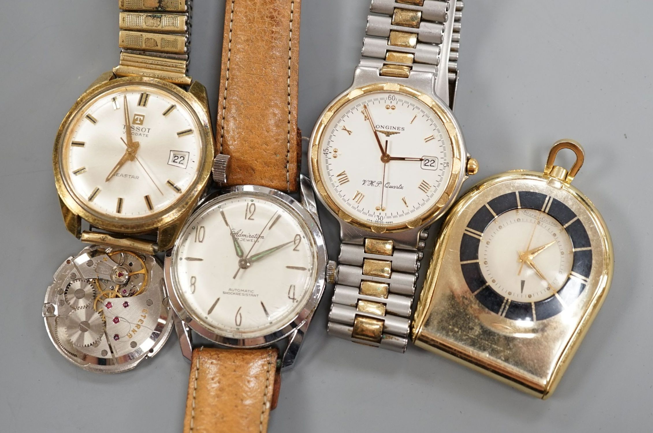 Three gentleman's wrist watches, Tissot, Longines VHP quartz and Admiration, an Eterna movement and a Jaeger LeCoultre travelling watch.